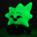 Promotional image from Makeship's listing showing the plush glowing in the dark.